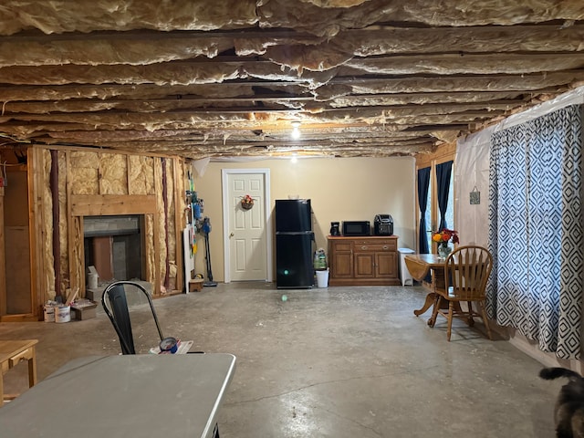 basement featuring black fridge