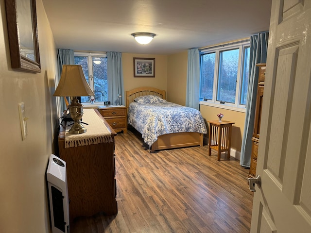 bedroom featuring hardwood / wood-style floors