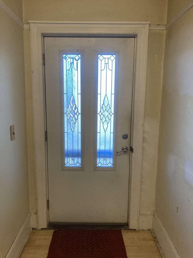 entryway with light hardwood / wood-style flooring