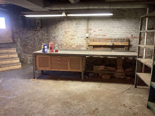 basement with a workshop area