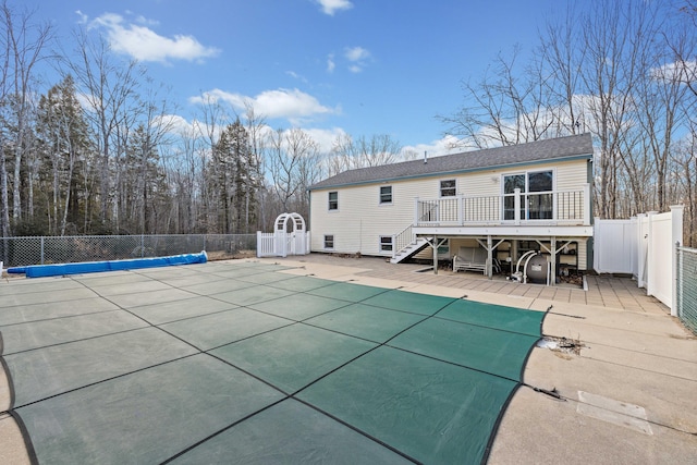 221 Frost Rd, Lyman, ME 04002 - view of swimming pool with a wooden deck, stairway, a fenced backyard, and a patio