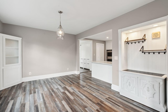 interior space with dark wood-type flooring