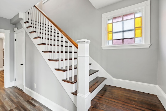 stairs with wood-type flooring