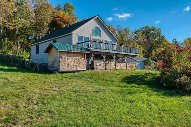 58 Wheeler Hill Rd, Phillips, ME 04966 - rear view of house with a wooden deck