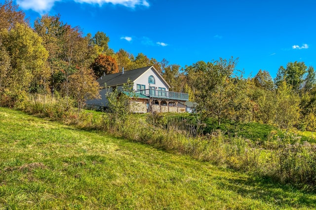 58 Wheeler Hill Rd, Phillips, ME 04966 - view of grassy yard with a wooded view