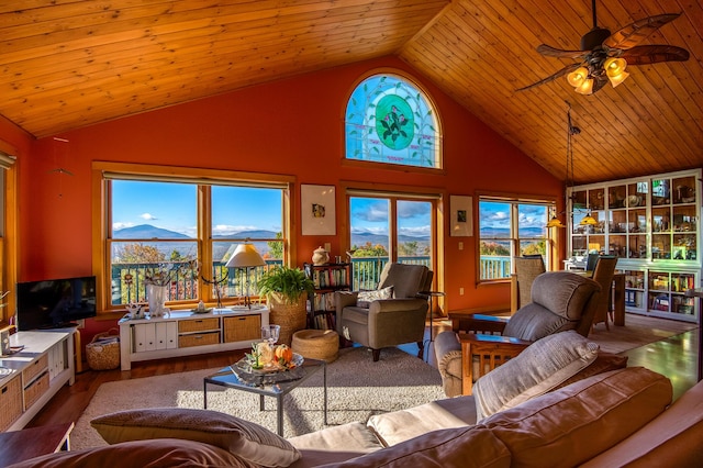 58 Wheeler Hill Rd, Phillips, ME 04966 - living room featuring wood finished floors, high vaulted ceiling, ceiling fan, and wooden ceiling