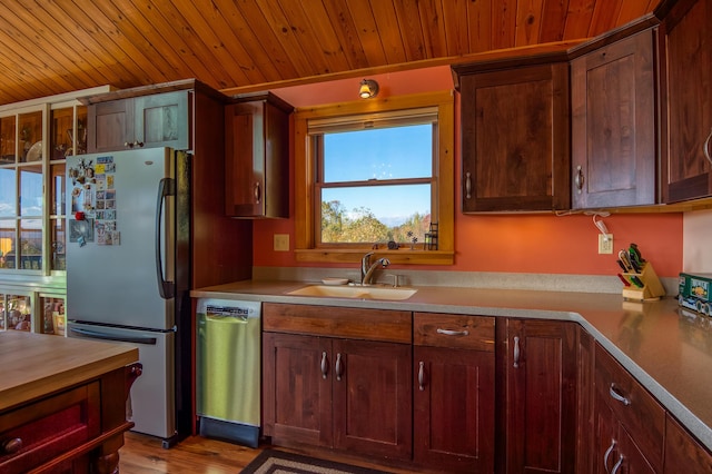 58 Wheeler Hill Rd, Phillips, ME 04966 - kitchen with stainless steel appliances, a sink, wood ceiling, and wood finished floors