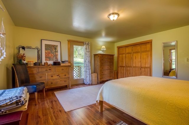 58 Wheeler Hill Rd, Phillips, ME 04966 - bedroom featuring wood finished floors and access to outside