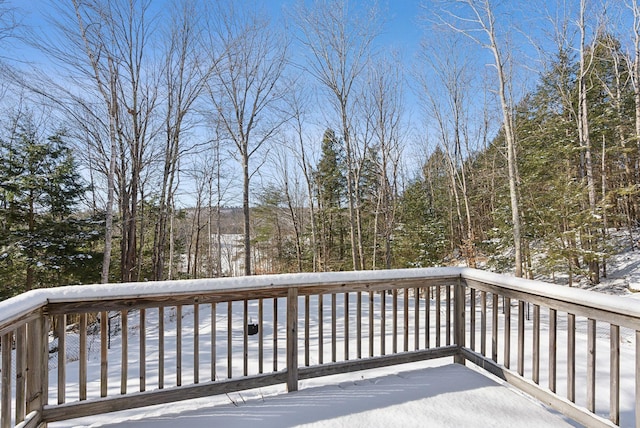 view of snow covered deck
