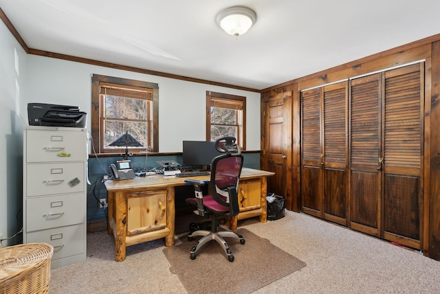 carpeted office featuring crown molding