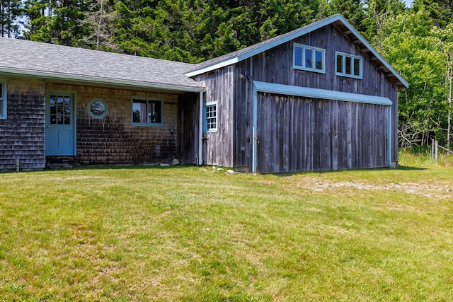 view of outdoor structure with a yard