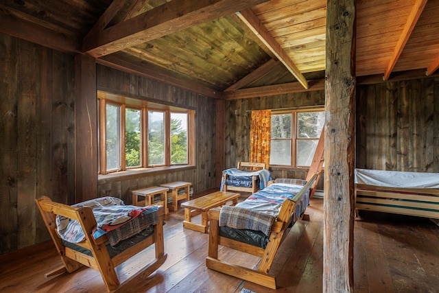 246 Marsh Stream Ln, Machiasport, ME 04655 - sitting room with vaulted ceiling, plenty of natural light, hardwood / wood-style floors, wooden ceiling, and wood walls