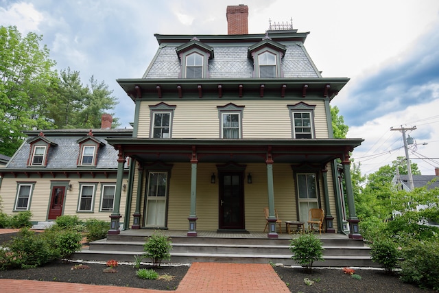 italianate-style house with covered porch