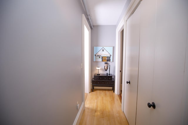 corridor featuring light hardwood / wood-style flooring