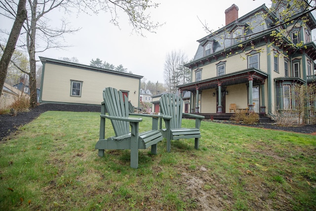 view of yard with a porch