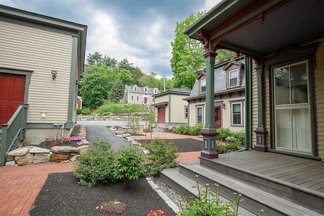 view of yard with a wooden deck