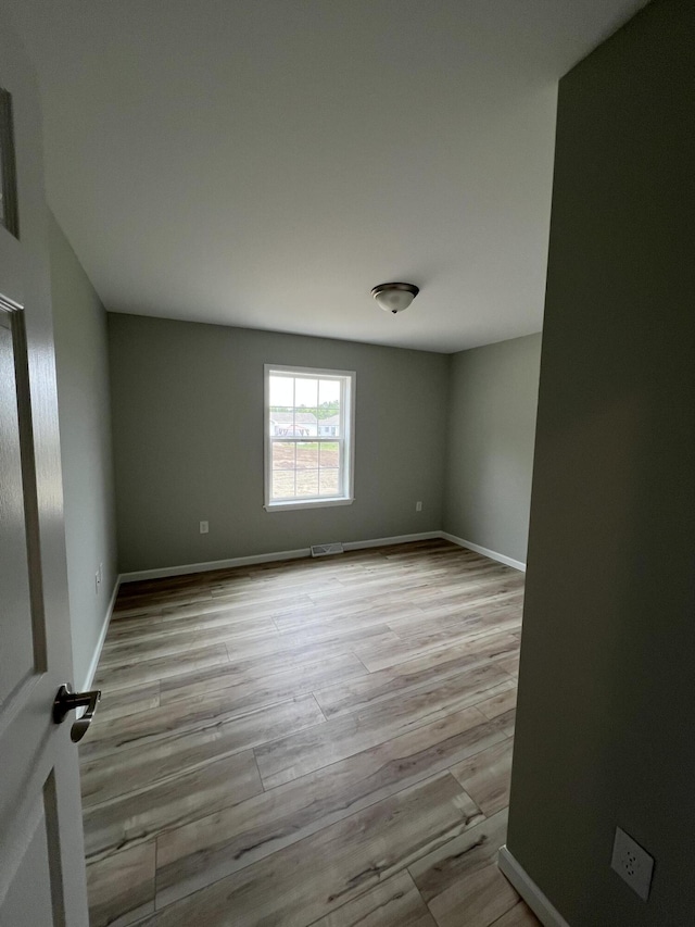 10 Mathew Way, Scarborough, ME 04074 - empty room with wood finished floors and baseboards