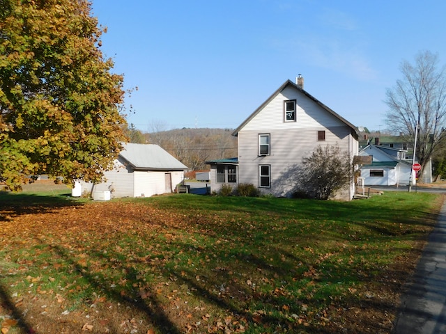 exterior space with a lawn