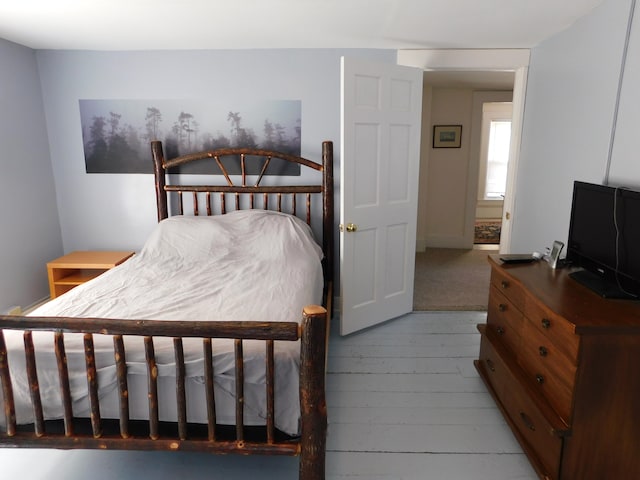 bedroom with light hardwood / wood-style flooring