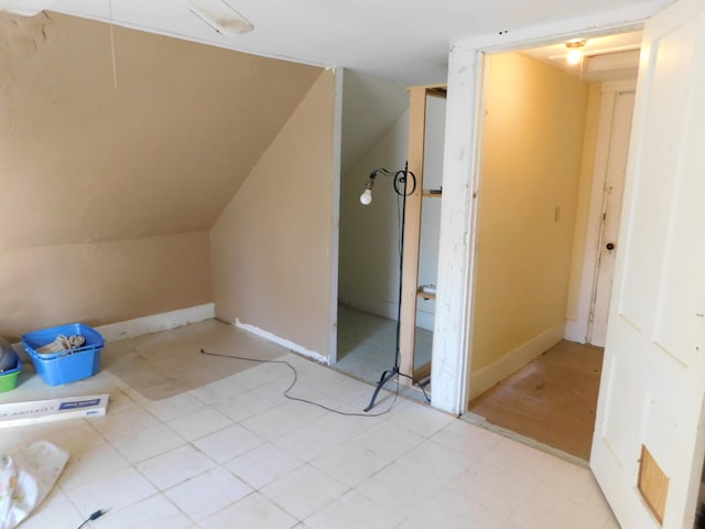 bonus room featuring lofted ceiling