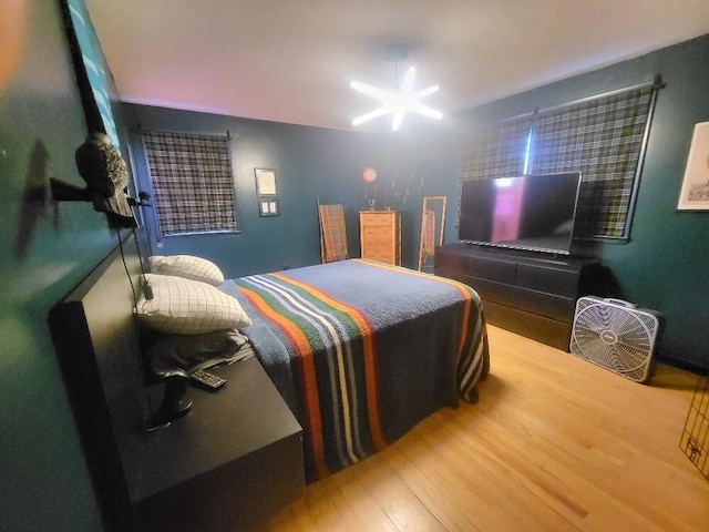 bedroom featuring wood finished floors