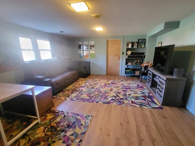 living area with wood finished floors