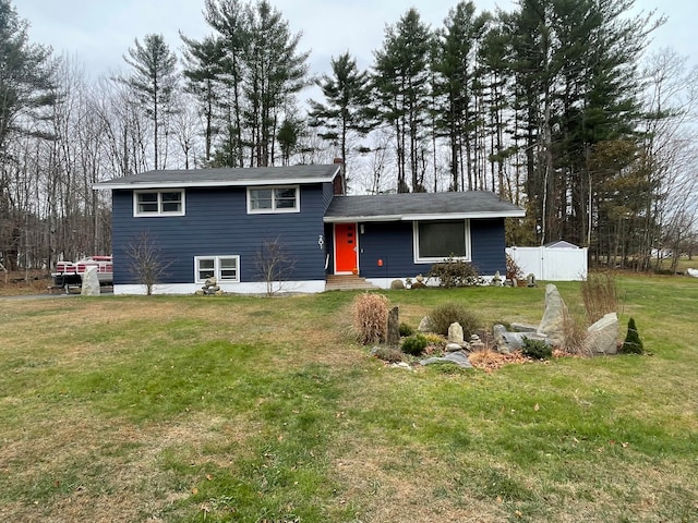 view of front of property with a front lawn