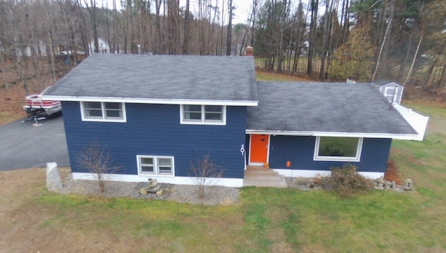 view of front of home with a front lawn