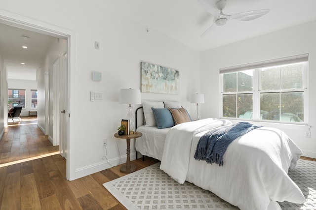 bedroom featuring hardwood / wood-style floors and ceiling fan