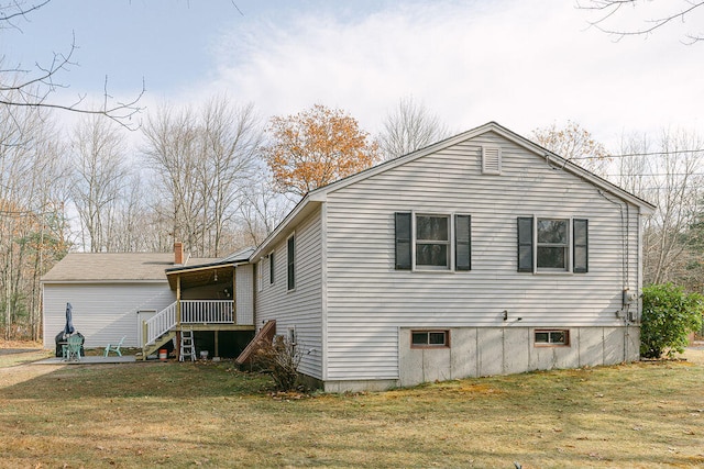 view of side of property featuring a yard