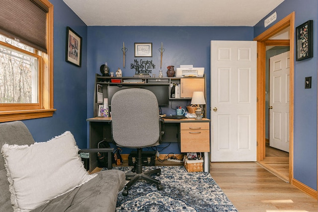 office area with light wood-type flooring