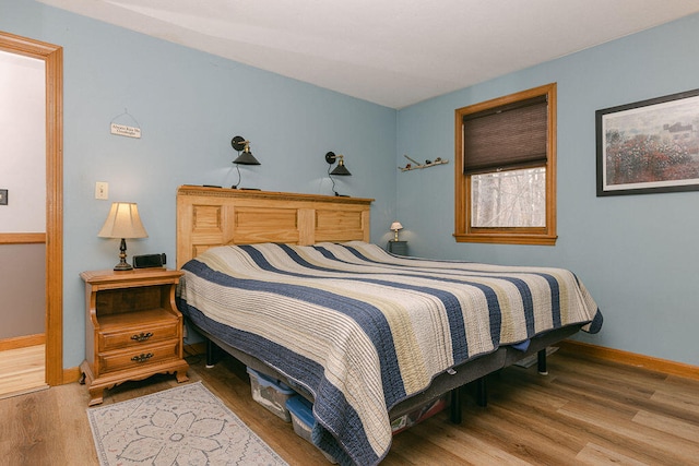 bedroom featuring hardwood / wood-style floors