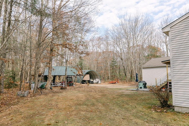 view of yard with a carport