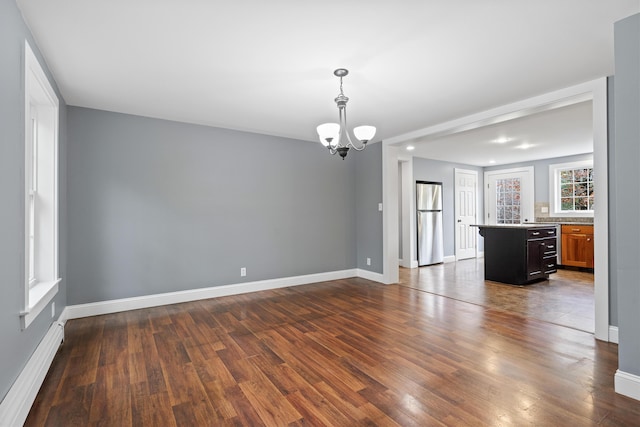 610 W Neck Rd, Nobleboro, ME 04555 - spare room featuring a chandelier and dark wood finished floors