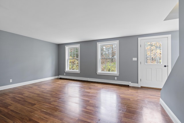 610 W Neck Rd, Nobleboro, ME 04555 - entryway with a baseboard radiator and wood finished floors