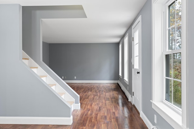 610 W Neck Rd, Nobleboro, ME 04555 - entrance foyer featuring baseboard heating, healthy amount of natural light, and dark wood-style flooring