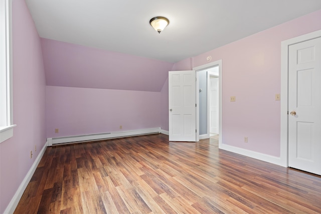 610 W Neck Rd, Nobleboro, ME 04555 - additional living space featuring a baseboard heating unit, wood finished floors, and lofted ceiling