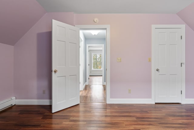 610 W Neck Rd, Nobleboro, ME 04555 - additional living space with wood finished floors, lofted ceiling, and baseboard heating