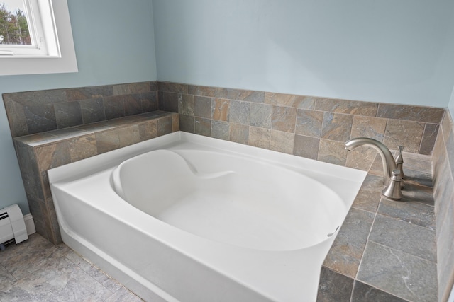 610 W Neck Rd, Nobleboro, ME 04555 - full bath with a bath, a baseboard radiator, and stone finish flooring