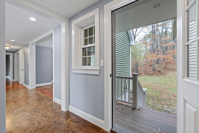 doorway to outside with dark wood-type flooring