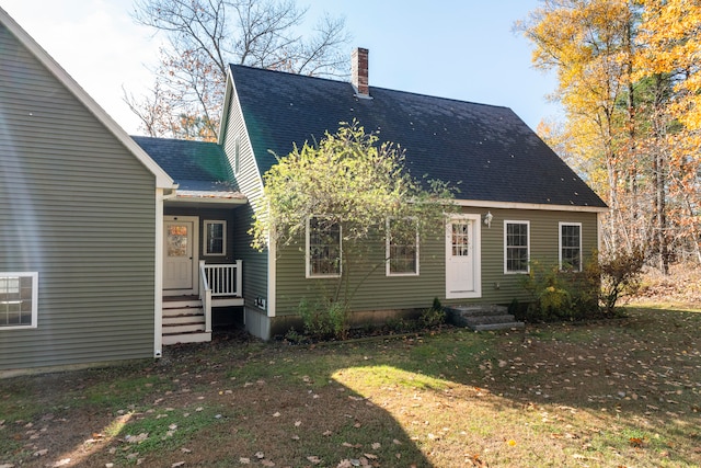 view of front of home with a front yard