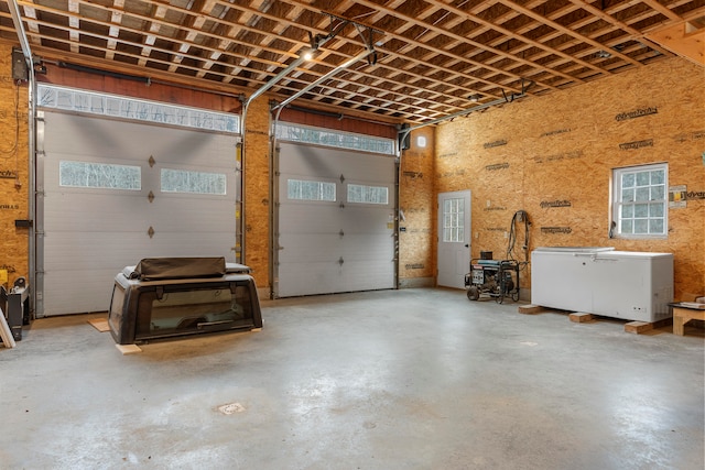 garage featuring refrigerator