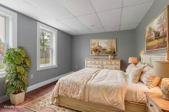610 W Neck Rd, Nobleboro, ME 04555 - bedroom featuring wood finished floors and a drop ceiling