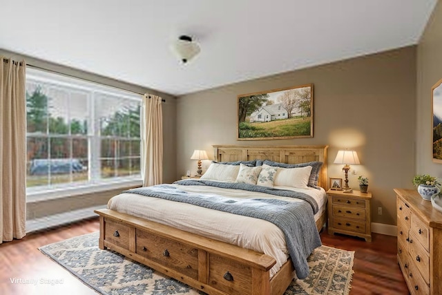 610 W Neck Rd, Nobleboro, ME 04555 - bedroom with baseboards and dark wood-style floors