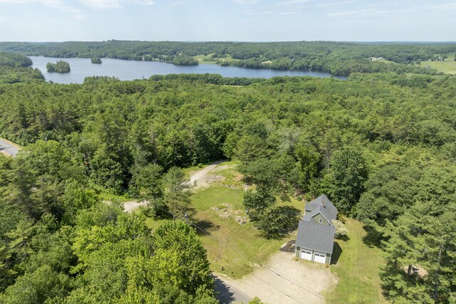 610 W Neck Rd, Nobleboro, ME 04555 - drone / aerial view of a forest and a nearby body of water