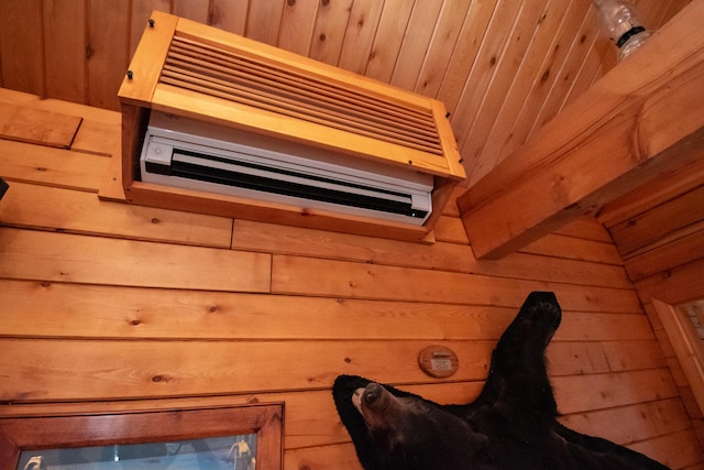 865 Barnard Rd, Williamsburg Twp, ME 04414 - detailed view of wood walls and a wall mounted AC