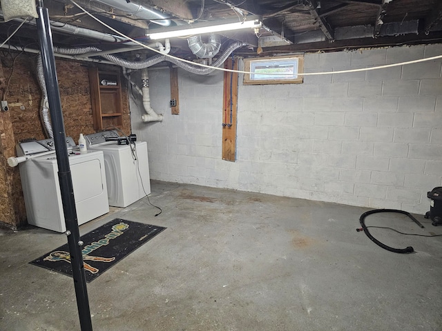 basement with washing machine and clothes dryer