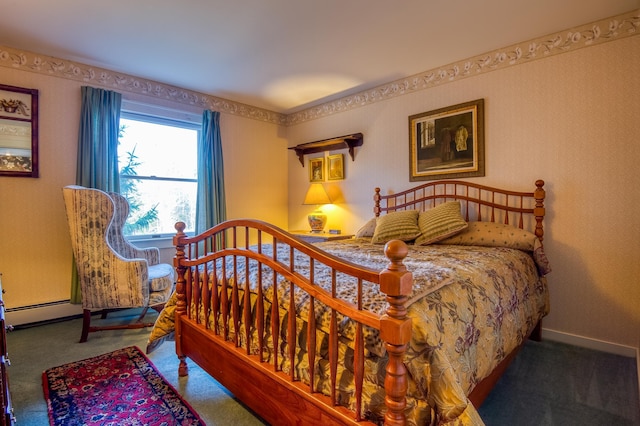 carpeted bedroom with a baseboard radiator