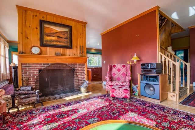 living room with hardwood / wood-style floors and a fireplace