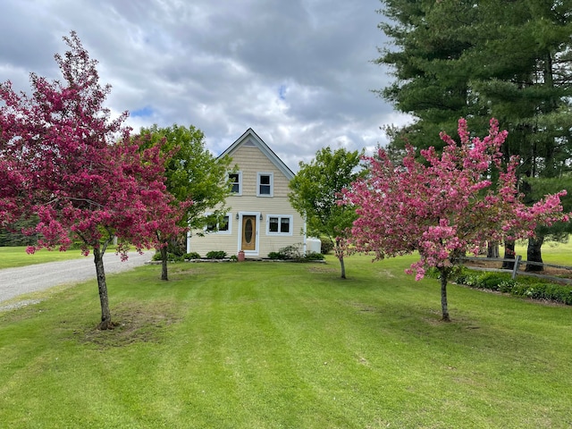 view of front of house with a front lawn